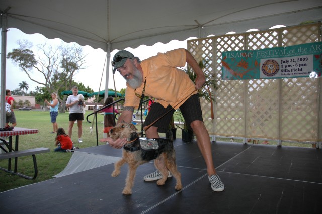 Dog Days of Summer: Dog owners strut their stuff at premier event
