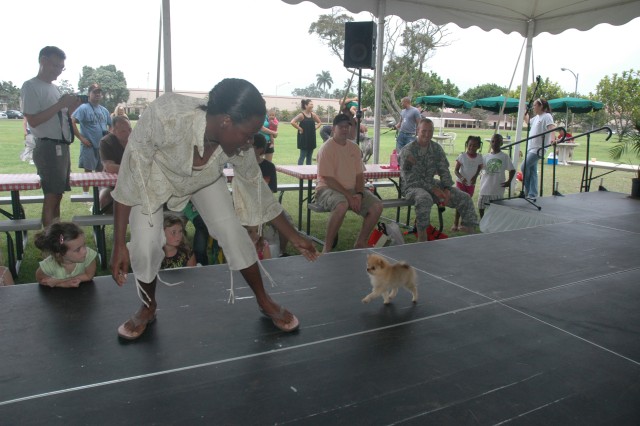Dog Days of Summer: Dog owners strut their stuff at premier event