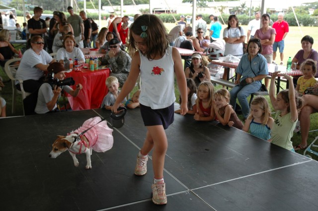 Dog Days of Summer: Dog owners strut their stuff at premier event