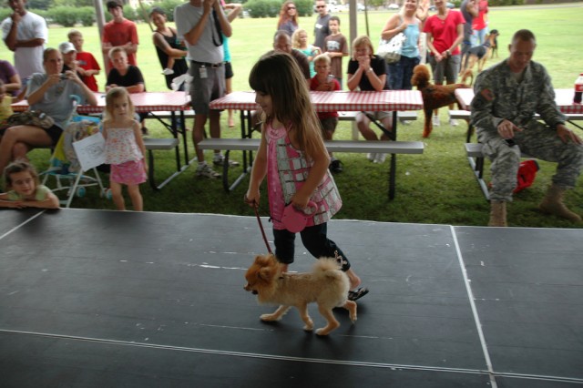 Dog Days of Summer: Dog owners strut their stuff at premier event