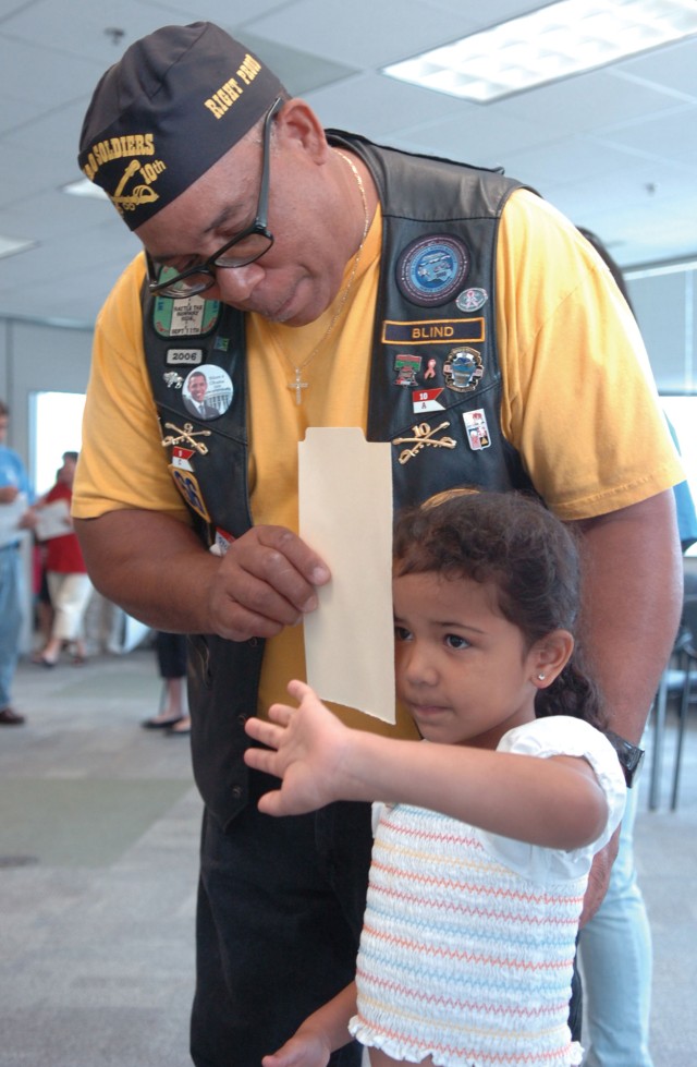 Volunteers provide free physicals for area youth