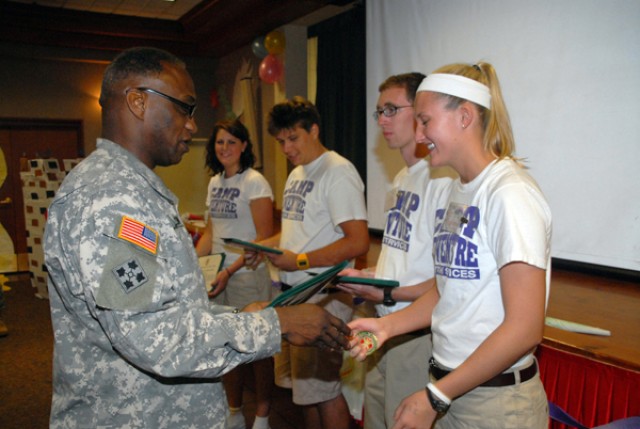 Camp Adventure counselors awarded certificates from commander