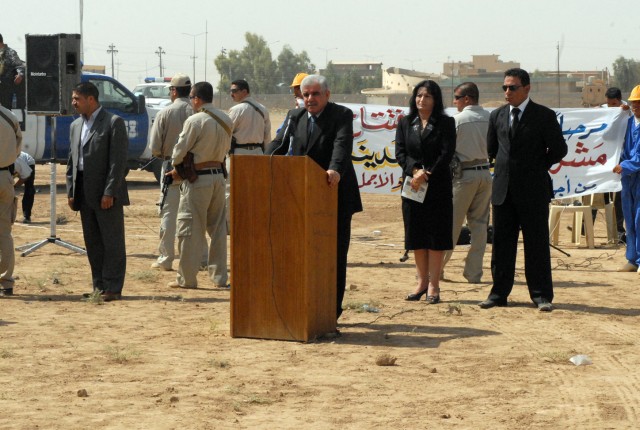 Kirkuk Governor Abdul Rahman Mustafa speaks to an audience during a ceremony in Kirkuk city, Iraq, August 9, celebrating the beginning of a two-month beautification project set to educate residents on proper waste disposal and remove trash and...