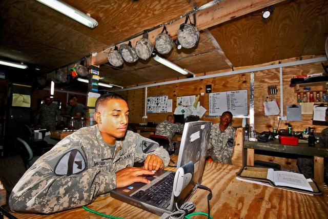 CAMP TAJI, Iraq-Sgt. Bismark Miolin, from Edison, N.J., an armament specialist on AH-64D Apache attack helicopters in Company D, 4th Battalion, 227th Aviation Regiment, 1st Air Cavalry Brigade, 1st Cavalry Division, Multi-National Division -...