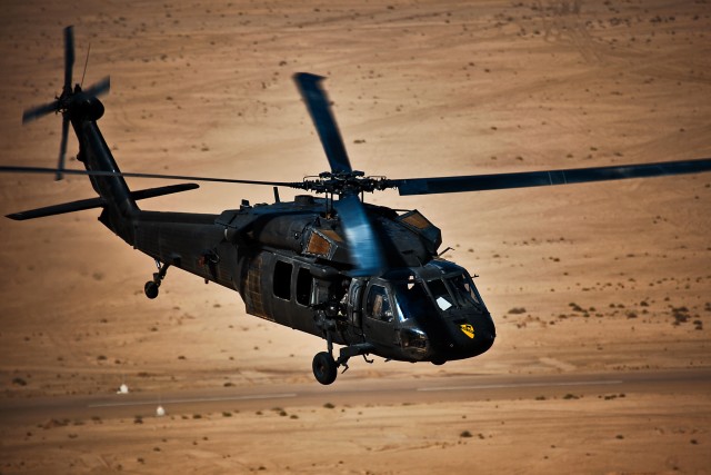 CAMP TAJI, Iraq-After completing training with Iraqi Army Soldiers, air crews from Company B, 3rd Battalion, 227th Aviation Regiment, 1st Air Cavalry Brigade, 1st Cavalry Division, Multi-National Division - Baghdad, make a return flight to Camp...