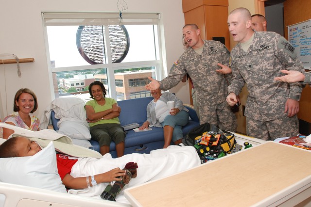 Paratroopers bring cheer to sick kids