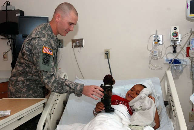 Paratroopers bring cheer to sick kids