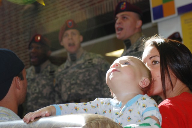 Paratroopers bring cheer to sick kids