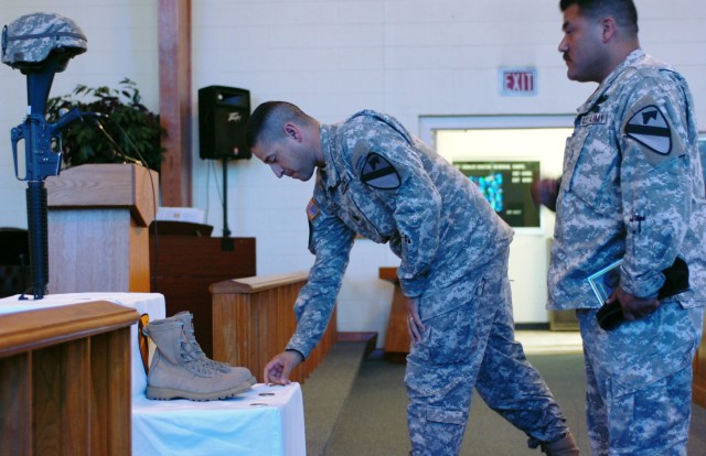 First Team Soldiers pay last respects to Spc. Lucas Bregg during a memorial service at the 1st Cavalry Division Chapel Aug. 20. Bregg served as a rifleman with the 2nd Battalion, 5th Cavalry Regiment, 1st Brigade Combat Team, 1st Cav. Div. He died...