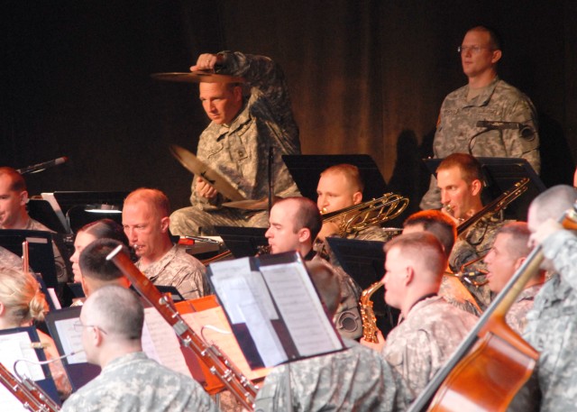 Master Sgt. John Jacobs adds the cymbals 