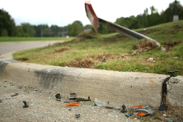 Yield sign and debris