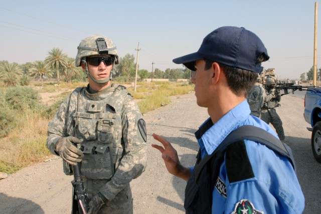 CAMP TAJI, Iraq- "I think the Iraqi people have the right to live in a free country," expressed Pennsboro, W. Va. native Spc. Christopher Burrows, a forward observer assigned to Headquarters and Headquarters Battery, 1st Battalion, 82nd Field Artille...