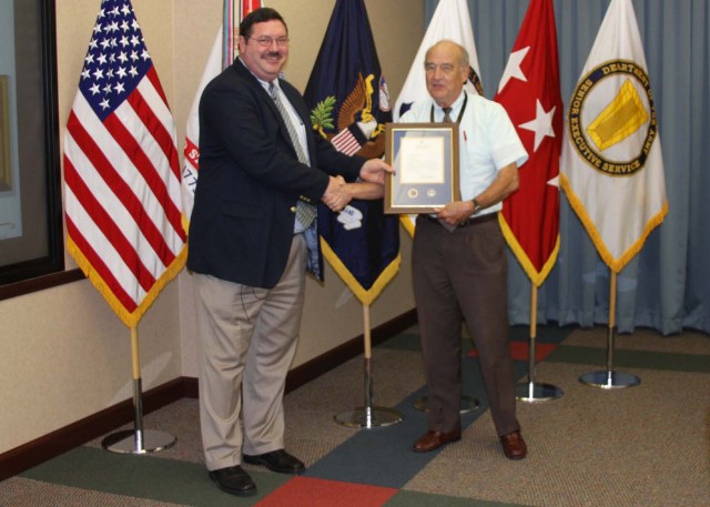 Patent award presented to senior scientist at USASMDC/ARSTRAT town hall meeting