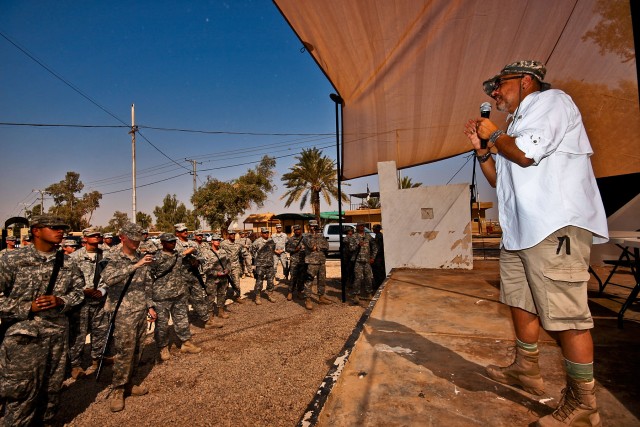 CAMP TAJI, Iraq-Soldiers of 4th Battalion, 227th Aviation Regiment, 1st Air Cavalry Brigade, 1st Cavalry Division, Multi-National Division - Baghdad, attend a speech by actor Joe Pantoliano (right) about mental illness. The presentation was part of t...