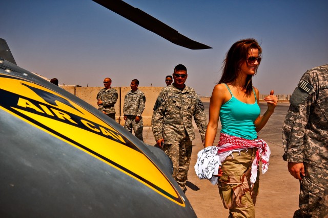CAMP TAJI, Iraq-During part of the 'Stomp the Stigma' tour, actess Lisa Jay made a visit to the 1st Air Cavalry Brigade, 1st Cavalry Division, Multi-National Division - Baghdad, flight line to get an understanding how the 1st ACB operates, Camp Taji,...