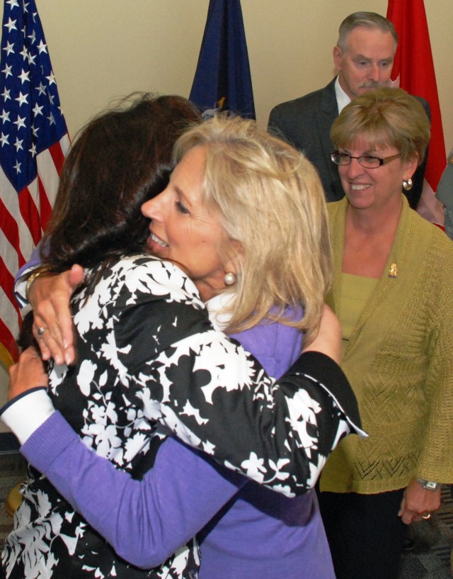 Dr. Biden hugs spouse of deployed Soldier