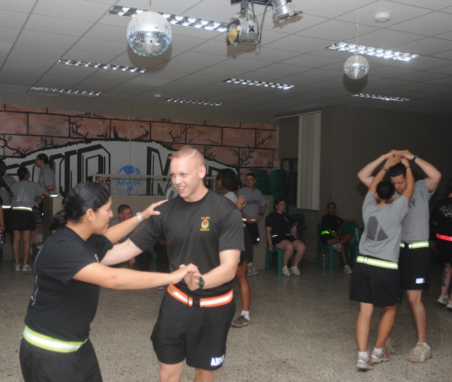 Deployed Soldier uses Salsa dancing to help cope with combat environment