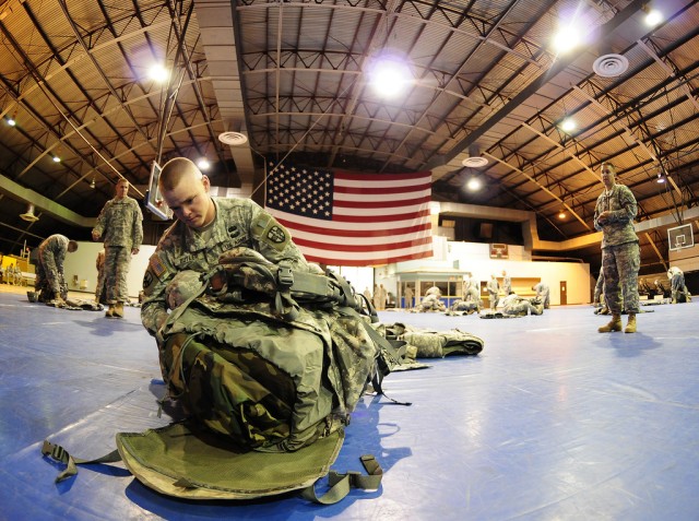 Staff Sgt. Butler packs equimpent