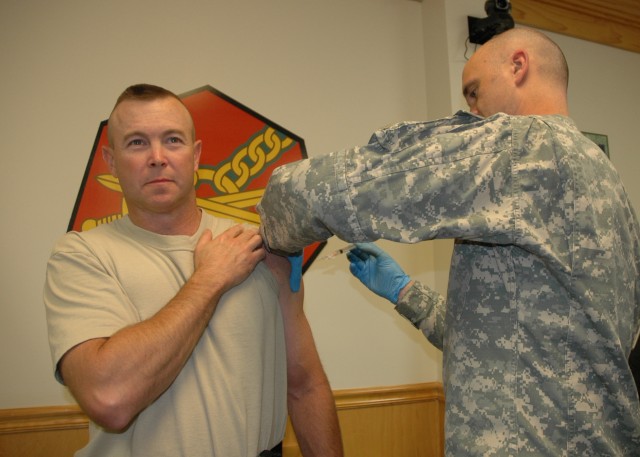 Winn Hospital Commander Gives 3rd ID Garrison Commander Flu Vaccination