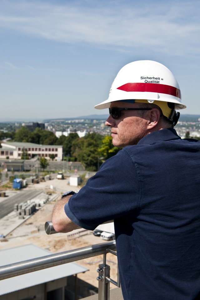 Michael Dennis looks out over a construction site 