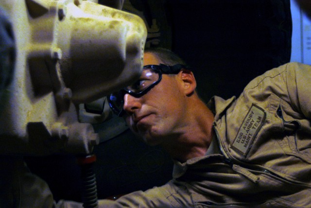 Staff Sgt. Michael D. Asbury, shop foreman for C Company, 2nd Battalion, 198th Combined Arms, Mississippi Army National Guard, out of Oxford, Miss., cleans and reseals a differential carrier on an MRAP Sept. 30. Diligent maintenance has helped the...