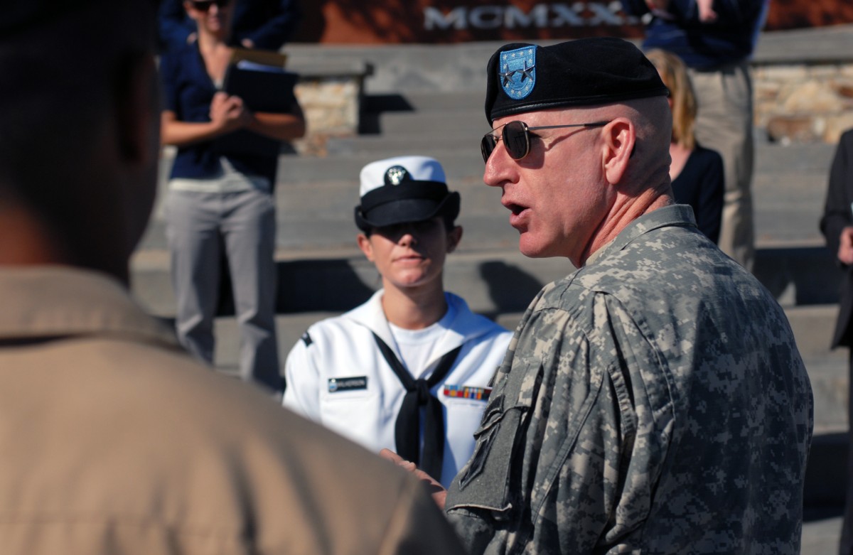 Visiting Maj. Gen. reenlists POM sailor. Article The United States Army