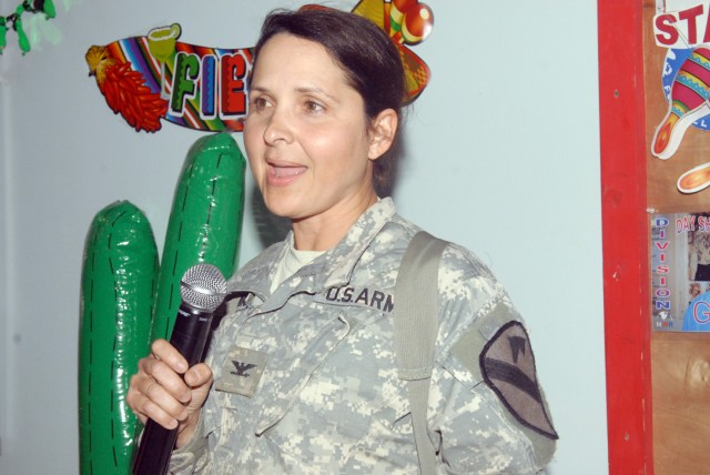 CAMP LIBERTY, Iraq - Col. Maria Zumwalt, of Bayamon, Puerto Rico, gives a speech highlighting the contributions of Hispanic-Americans at the Multi-National Division-Baghdad Hispanic Heritage Month Observation, here, Oct. 9. "The story of the Hispanic...