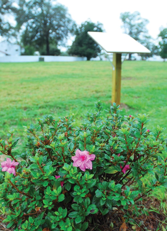 Scouts create memorial garden, fence 