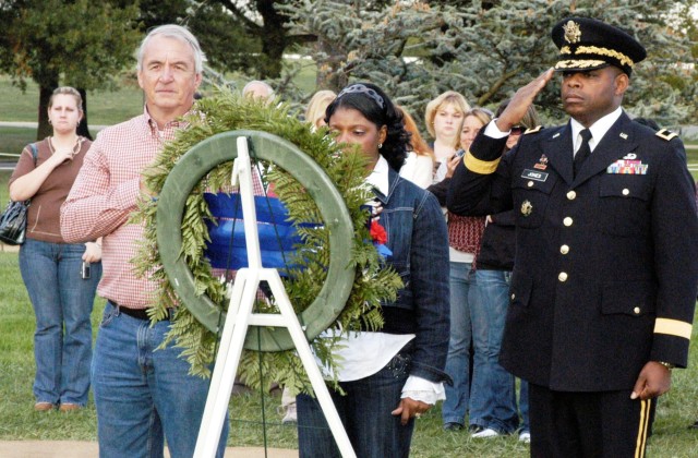 Survivors lay wreath