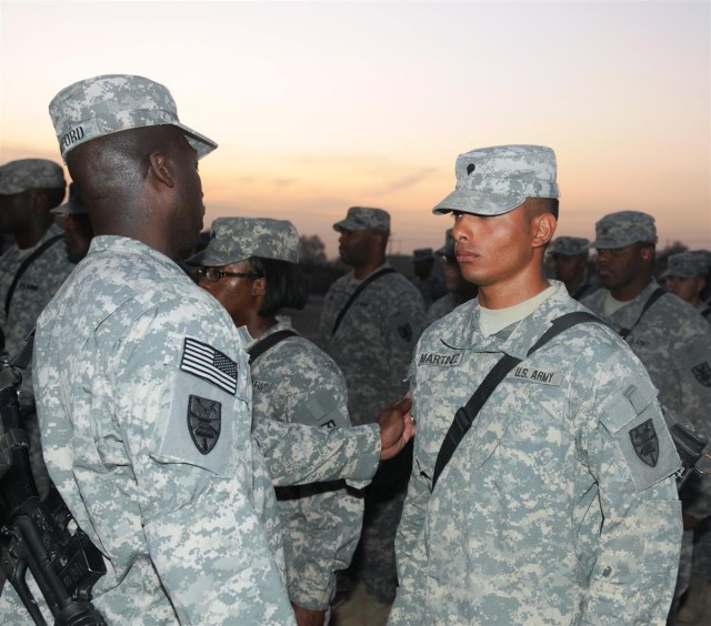 159th Seaport Operations Co. affixes combat patches