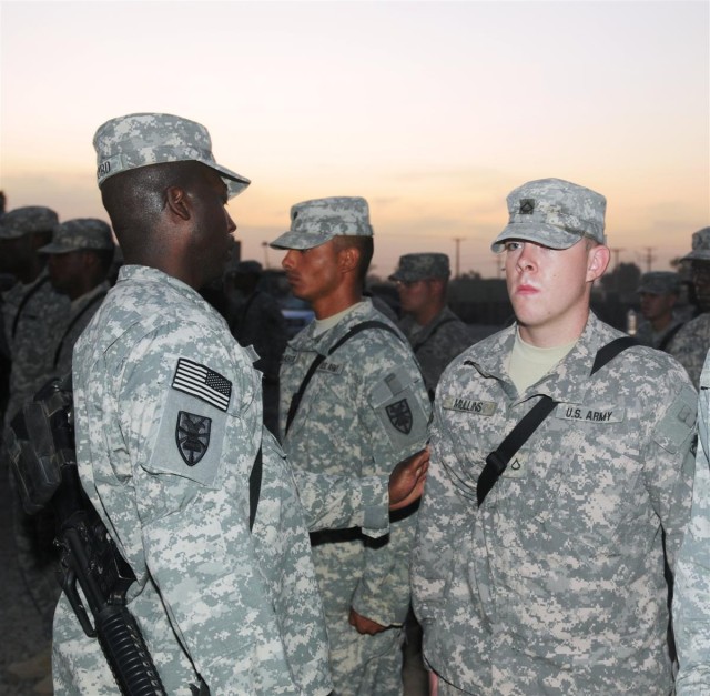 159th Seaport Operations Co. affixes combat patches