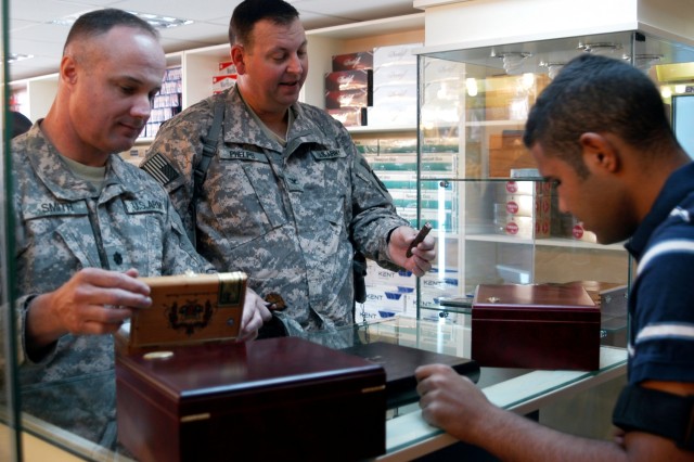 CONTINGENCY OPERATING LOCATION Q-WEST, Iraq - Lt. Col. William B. Smith, Jr. (left), the Q-West Mayor with 2nd Battalion, 198th Combined Arms, and a Hattiesburg, Miss., native, and Col. Larry Phelps, commander of the 15th Sustainment Brigade,...