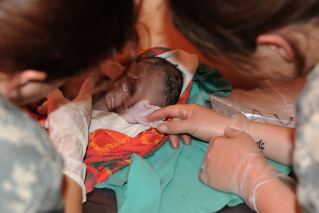 Army Reserve nurse delivers baby in rural Uganda