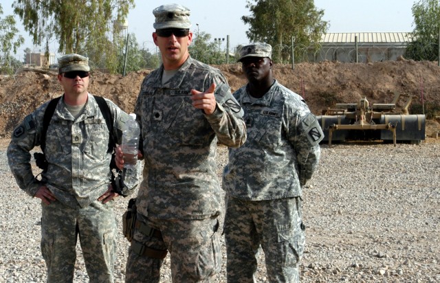 CONTINGENCY OPERATING LOCATION Q-WEST, Iraq - During an Oct. 11 excess property inspection, Lt. Col. Kerry Goodman (middle), a native of Meridian, Miss., and commander of 2nd Battalion, 198th Combined Arms headquartered in Senatobia, Miss., stands...