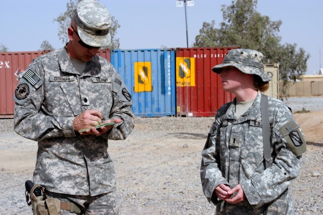 CONTINGENCY OPERATING LOCATION Q-WEST, Iraq - During an excess property inspection here, Lt. Col. Kerry Goodman (left), a native of Meridian, Miss., and commander of 2nd Battalion, 198th Combined Arms headquartered in Senatobia, Miss., notes...