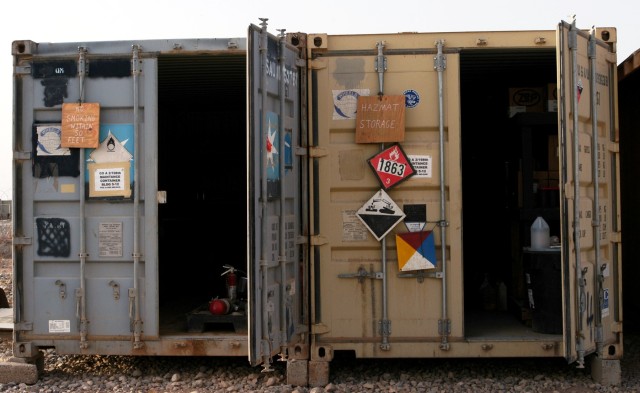 CONTINGENCY OPERATING LOCATION Q-WEST, Iraq - A pair of storage containers owned by Company A, 2nd Battalion, 198th Combined Arms, stand opened during an excess property inspection here Oct. 11. The battalion-wide inspection was in preparation for...