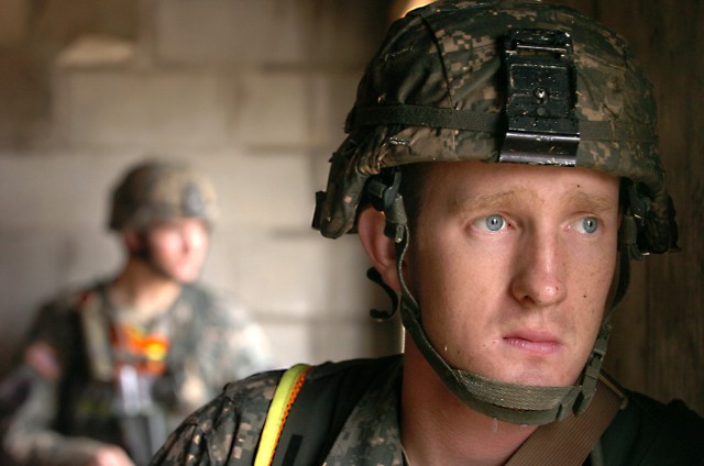 Capt. Ben Jackman, commander of Troop B, 1st Squadron, 9th Cavalry Regiment, 4th BCT, 1st Cav. Div., of Princeton, N.J., watches out for enemy activity as he allows his team to take a much needed break during the Spur Ride's Scout's skills portion...