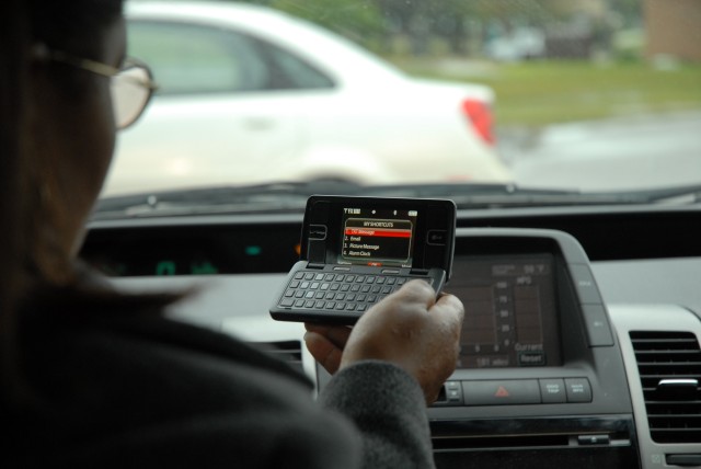 Text u L8er: MPs crack down on cell phone users