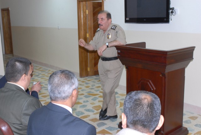 Major General Dlear Ahmed, the head police investigator at the Criminal Forensics Lab in Erbil, explains to a group of 18 judges and lawyer how his lab is using modern equipment to help solve criminal cases. This group visited the lab Oct. 27 to...