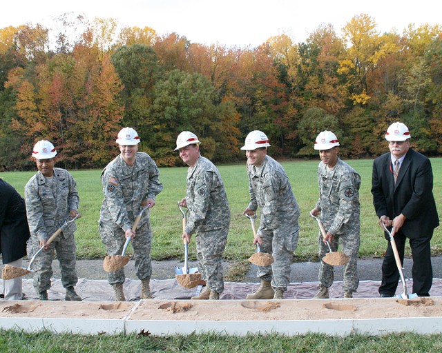 Shoveling ceremonial sand