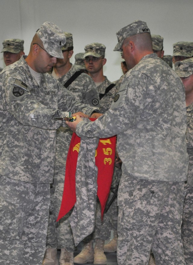 First Lt. Randall Holmes, the commander of the 351st Ordnance Detachment and Leesburg, Va., native, and Sgt. 1st Class Gerald McIntyre, the detachment's noncommissioned officer in charge and Waynesboro, Pa., native, case the unit's guidon in...