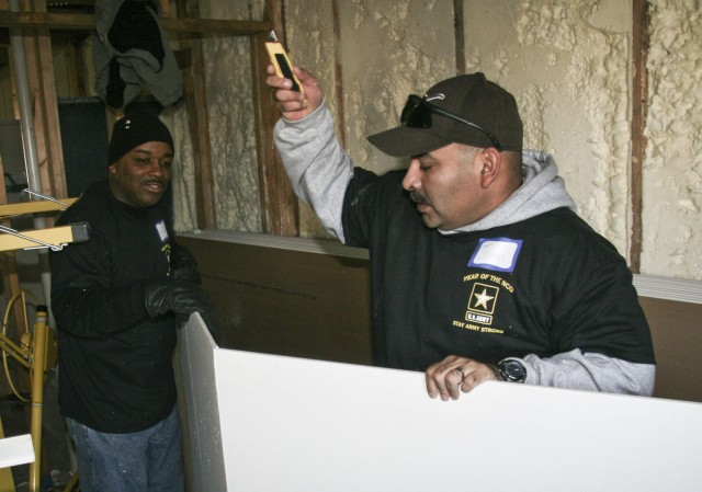 ASC Soldiers help make house a home