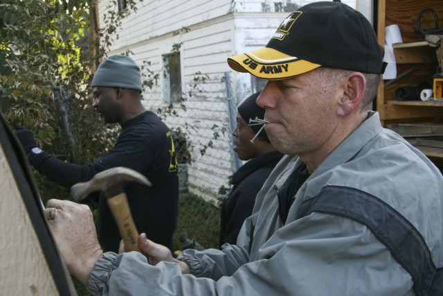 ASC Soldiers help make house a home