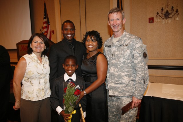 Texas Secondary Teacher of the Year with family and Fort Bliss commander