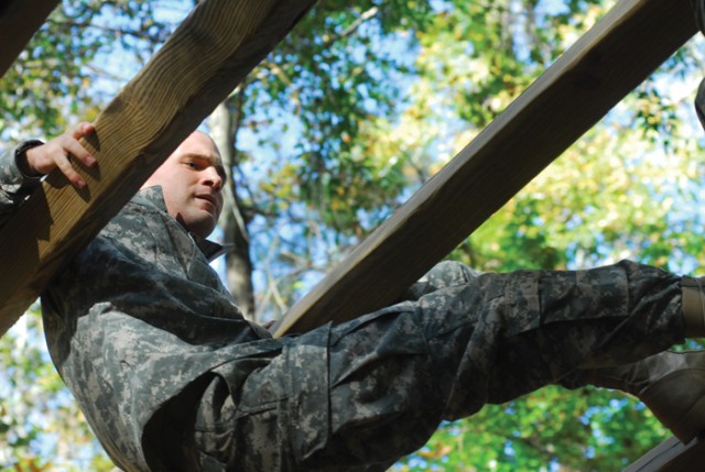 Recruits crawl, climb, swing through training