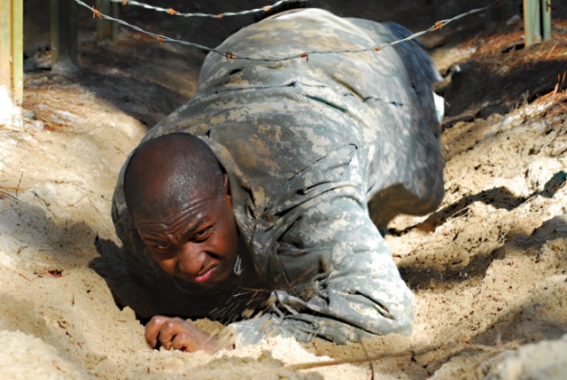 Recruits crawl, climb, swing through training