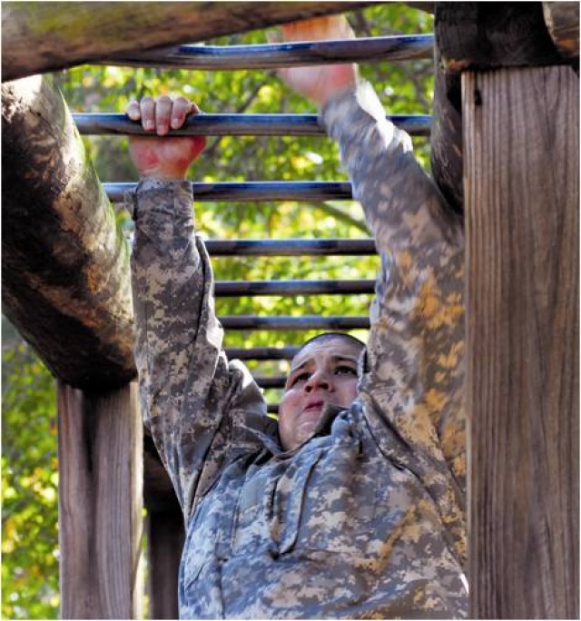 Recruits crawl, climb, swing through training