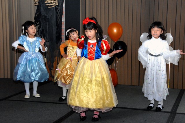 Korean and American school children celebrate Halloween
