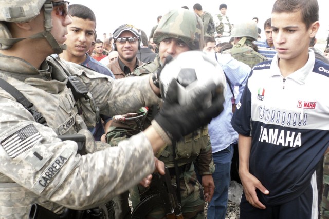 Texas Soldiers bring soccer, unity to Iraqi village