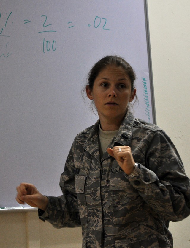 Airforce 1st Lt. Augusta Fehn, defense contract manager and Las Vegas native, instructs a Functional Academic Skills Training class at the newly reopened education center here, Nov. 5. (U.S. Army photo by Sgt. Matthew C. Cooley, 15th Sustainment...